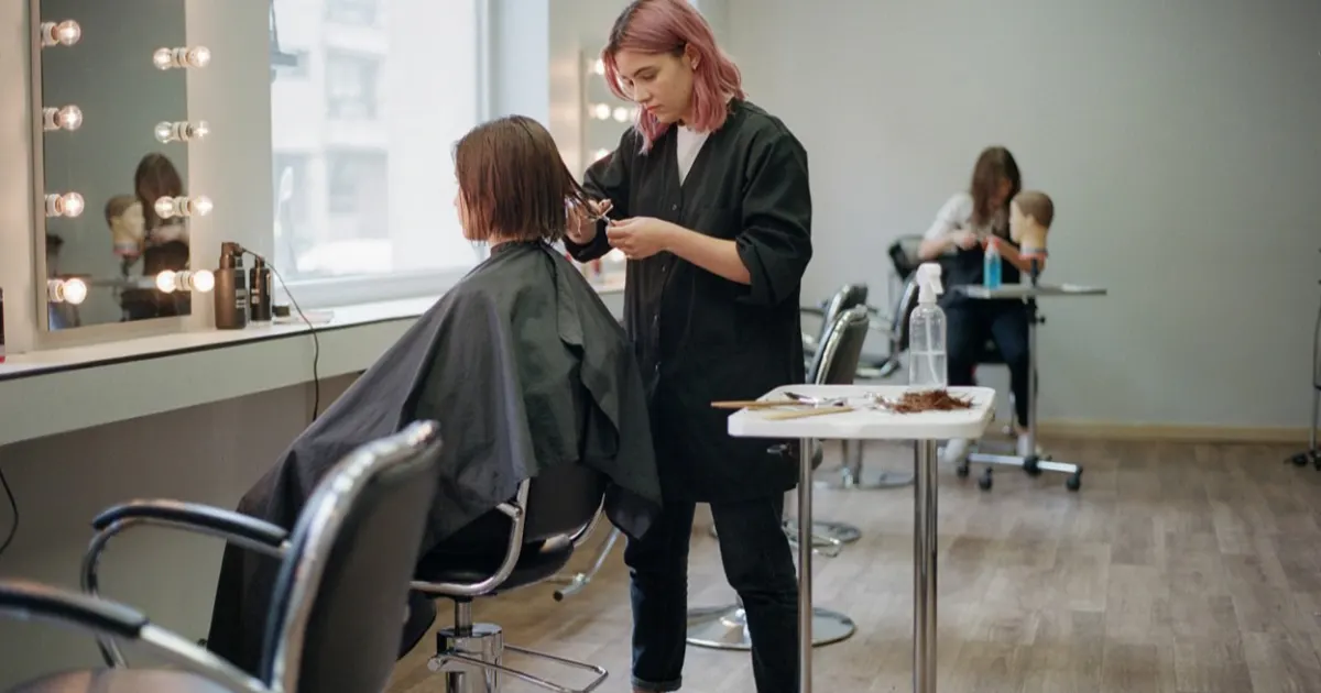 Students training in a cosmetology program